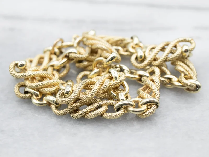 Unique Birthstone Necklaces-Yellow Gold Textured Knot Link Necklace with Spring Ring Clasp